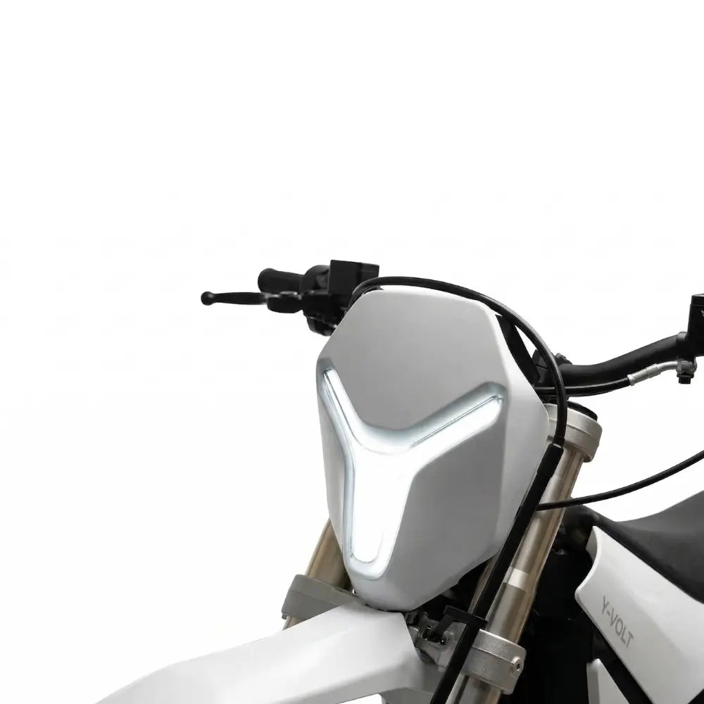 Y-Volt Surge V electric bike battery from The Ebike Shop, showing sleek black design with connection ports and branding.