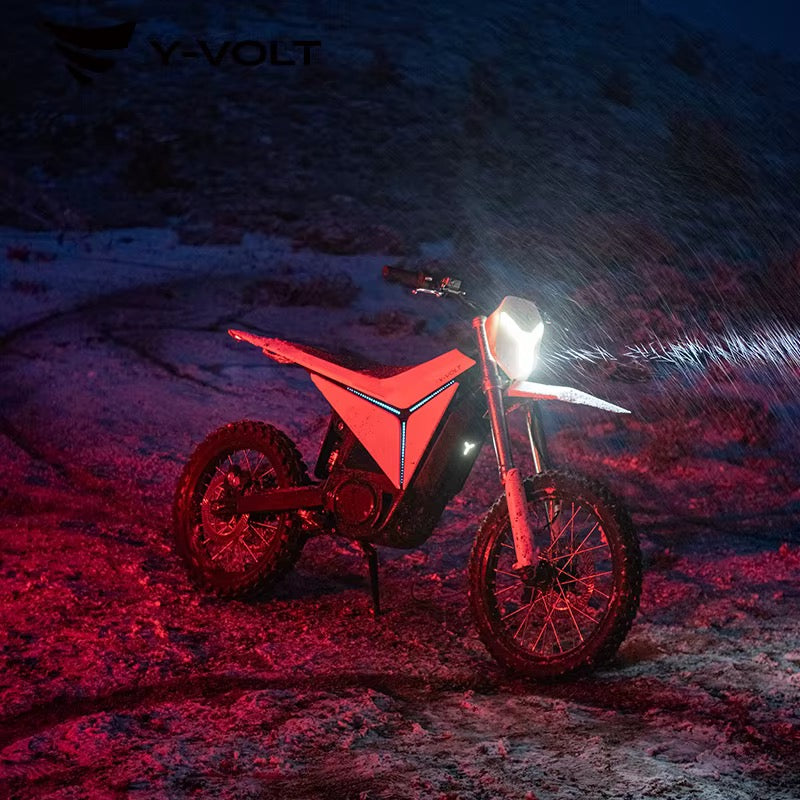 Y-Volt Surge V electric bike battery by The Ebike Shop showing sleek black design and charging ports