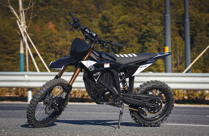 Altis Delta electric dirt bike by The Ebike Shop with rugged frame and knobby tires, designed for off-road riding.