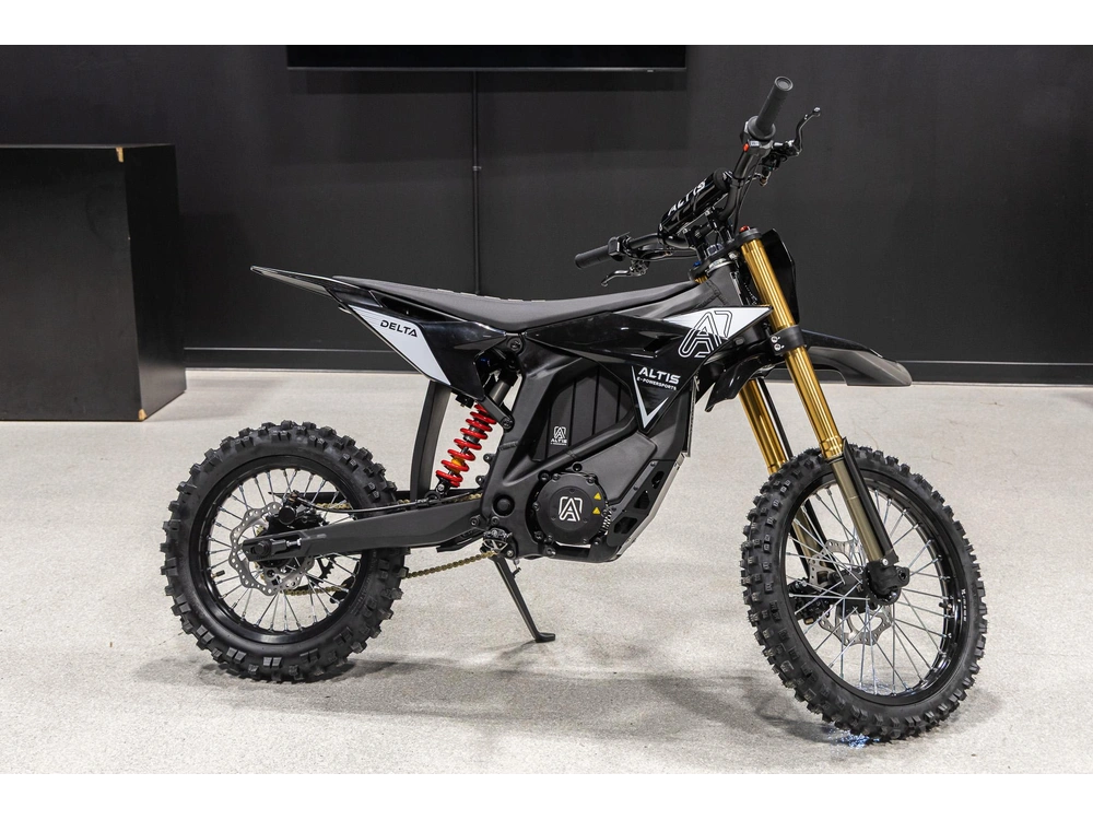 Altis Delta electric dirt bike by The Ebike Shop, showing a rugged black and green off-road e-bike with thick tires and suspension.
